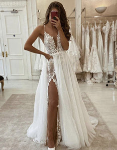 A Line Spaghetti Strap V-Neck Tull Wedding Dress With Slit